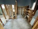 Bathroom under renovation with exposed framing and tiled floor at 415 86Th Ave, St Pete Beach, FL 33706