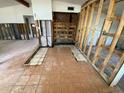 Kitchen under renovation with exposed framing and tiled floor at 415 86Th Ave, St Pete Beach, FL 33706