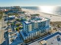 Beautiful beachside building with blue accents and stunning views of the Gulf at 15 Avalon St # 704, Clearwater Beach, FL 33767