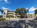 Two-story condo building with ample parking and landscaping at 2220 Spanish Dr # 10, Clearwater, FL 33763