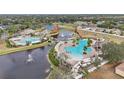 Two community pools, tennis courts, and a pond at 11908 Whisper Creek Dr, Riverview, FL 33569