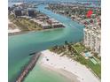 Aerial view of waterfront property with beach access and resort-style amenities at 504 79Th Ave, St Pete Beach, FL 33706