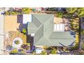 Aerial view showing home's layout, roof, and surrounding landscape at 504 79Th Ave, St Pete Beach, FL 33706