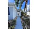 Front walkway of the house leading to the entrance at 1333 Misty Greens Dr, Sun City Center, FL 33573