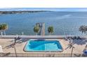 Community pool with bay views at 7100 S Sunshine Skyway S Ln # 503, St Petersburg, FL 33711