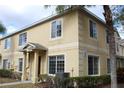 Exterior view of a two-story home with AC unit at 10737 Keys Gate Dr, Riverview, FL 33579