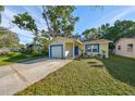 Charming single story home with a newly painted exterior and updated garage door at 7471 35Th N St, Pinellas Park, FL 33781