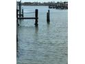 Docks with pilings and ropes in the water at 409 Boca Ciega Point S Blvd # 1008, St Petersburg, FL 33708