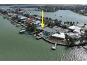 Home on the water with a large backyard at 806 Bay Point Dr, Madeira Beach, FL 33708