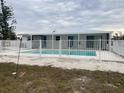 Home with private pool and fenced backyard at 87 Rotonda Cir, Rotonda West, FL 33947