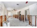 Empty living room under renovation at 154 81St N Ave, St Petersburg, FL 33702