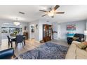 Open concept dining area with a marble table and chandelier at 196 Annapolis Ln, Rotonda West, FL 33947