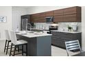 Modern kitchen featuring stainless steel appliances and a large island at 1716 22Nd N Ave, St Petersburg, FL 33713