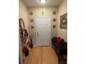 Bright entryway with hardwood floors and decorative accents at 1910 E Palm Ave # 10303, Tampa, FL 33605