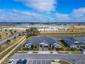 Aerial view of homes near a community water park at 31451 Moniker Mast Ln, San Antonio, FL 33576