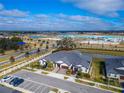 Aerial view showing home location near a lagoon at 31451 Moniker Mast Ln, San Antonio, FL 33576