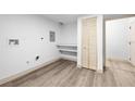 Laundry room with louvered closet doors and space for washer and dryer at 6462 92Nd N Pl # 802, Pinellas Park, FL 33782