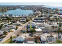 Aerial view showcasing a house's location near a waterfront area at 255 146Th Ave E, Madeira Beach, FL 33708