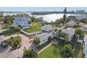 Property's waterfront location and landscaping are highlighted in this aerial view at 15825 Redington Dr, Redington Beach, FL 33708