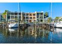 Building with water access, multiple boat slips and beautiful reflection at 907 Bahia Del Sol Dr, Ruskin, FL 33570