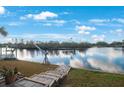 Steps leading to the water; peaceful waterfront view at 1069 Rushmore Dr, Holiday, FL 34690