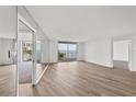 Spacious living room with hardwood floors and water views at 2611 Bayshore Blvd # 506, Tampa, FL 33629