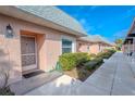 Exterior view of condo building and walkway at 3743 Teeside Dr, New Port Richey, FL 34655