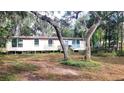 Mobile home exterior view, needs some work at 12403 Banbury Ave, New Port Richey, FL 34654