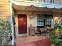 Front porch with festive decorations and seating at 21038 Voyager Blvd # 4, Land O Lakes, FL 34638