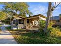 House with a carport and mature trees at 4734 15Th S Ave, St Petersburg, FL 33711