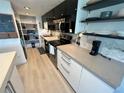 Modern kitchen with updated appliances and sleek cabinetry at 470 3Rd S St # 405, St Petersburg, FL 33701