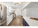 Modern kitchen with stainless steel appliances and white cabinets at 8304 Sandstone Ct, Tampa, FL 33615