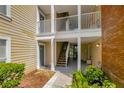 Exterior condo building stairs and walkway at 10110 Winsford Oak Blvd # 612, Tampa, FL 33624