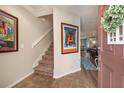 Staircase leading to the upper level of the home at 5025 Cactus Needle Ln, Wesley Chapel, FL 33544