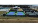 Community tennis courts with blue and green surfaces at 6743 Bar S Bar Trl, Zephyrhills, FL 33541