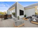 Relaxing rooftop deck with outdoor furniture and city views at 6117 E 113Th Ave, Temple Terrace, FL 33617