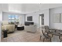 Spacious living room with water views and dining area at 5108 Brittany S Dr # 506, St Petersburg, FL 33715