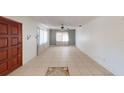 Living room with tile flooring and a ceiling fan at 16201 Gulf Blvd, Redington Beach, FL 33708