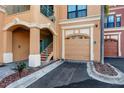 Condo exterior showing reserved parking and stairs leading to unit at 2733 Via Cipriani # 830A, Clearwater, FL 33764