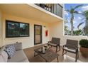 Inviting outdoor patio with comfortable seating, perfect for relaxing and entertaining at 7550 Sunshine Skyway S Ln # T48, St Petersburg, FL 33711