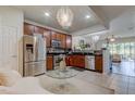 Spacious kitchen with stainless steel appliances and granite countertops at 10280 Post Harvest Dr, Riverview, FL 33578