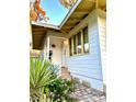 Home features a charming entrance with walkway and landscaping at 2666 44Th S St, Gulfport, FL 33711