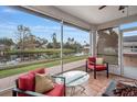 Relaxing screened patio overlooking a tranquil canal, perfect for enjoying Florida living at 5506 79Th E Ave, Palmetto, FL 34221