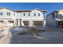 Newly constructed townhome with attached garage and modern facade at 5727 Desert Rose Pl, Tampa, FL 33615