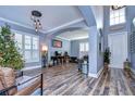 Open and airy living area with hardwood floors and a cozy atmosphere at 13181 Linzia Ln, Spring Hill, FL 34609