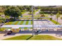 Community shuffleboard and bocce ball courts with covered seating at 119 Saint Pierres Way, Apollo Beach, FL 33572