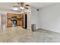 Kitchen boasts stainless steel appliances and light wood cabinets at 2287 Philippine Dr # 31, Clearwater, FL 33763