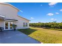 Spacious backyard with patio and waterfront access at 4610 Bay Crest Dr, Tampa, FL 33615