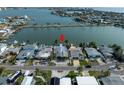 Aerial view of waterfront home with private dock and boat access at 16124 4Th E St, Redington Beach, FL 33708