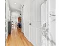 Bright entryway with hardwood floors and white doors at 216 S Westland Ave # 4, Tampa, FL 33606